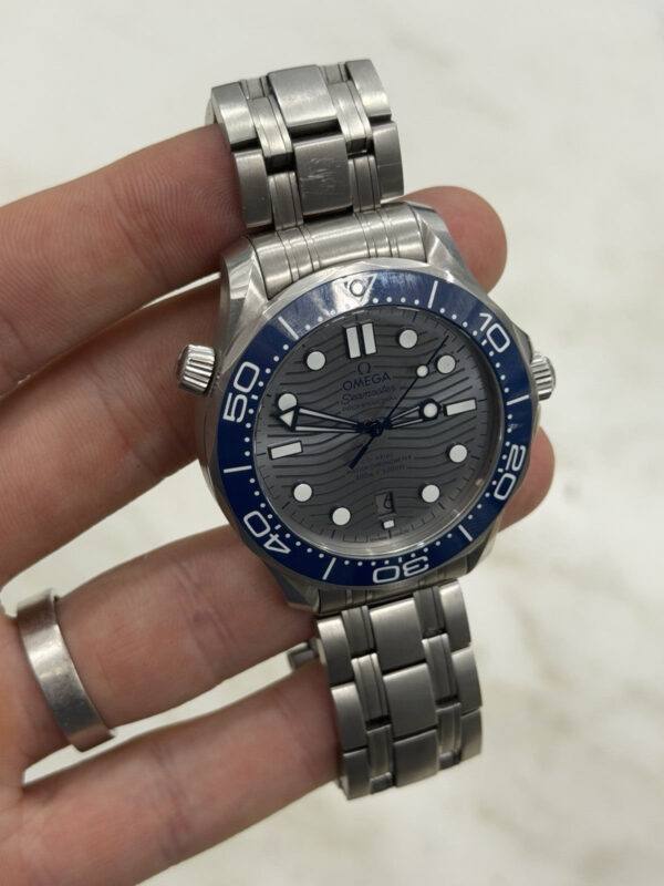 57_5fad3749-f27e-4d1e-9f7b-178d9caccb21 2024 Omega Seamaster Steel Gray Dial 42mm Automatic Watch 210.30.42.20.06.001