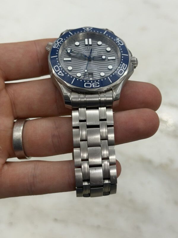 57_77f91427-0926-4fa7-9e63-5ee24f51a6a7 2024 Omega Seamaster Steel Gray Dial 42mm Automatic Watch 210.30.42.20.06.001